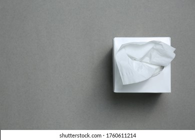 Box Of Paper Tissues On Grey Background, Top View. Space For Text