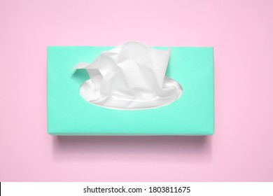 Box With Paper Tissues On Pink Background, Top View