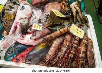 Box With Raw Seafood Selling On Market In Japan