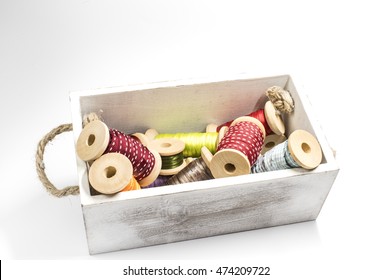 Box with ribbon spools