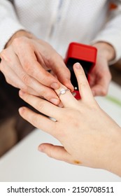 Box With A Ring For Marriage Proposal Hands