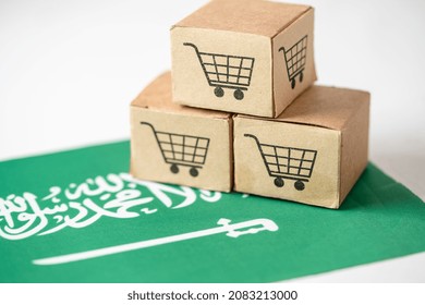 Box With Shopping Cart Logo And Saudi Arabia Flag, Import Export Shopping Online Or ECommerce Finance Delivery Service Store Product Shipping, Trade, Supplier Concept.