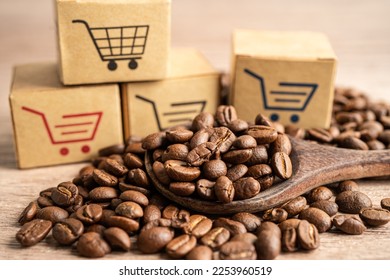 Box with shopping cart logo symbol on coffee beans, Import Export Shopping online or eCommerce delivery service store product shipping, trade, supplier concept. - Shutterstock ID 2253960519