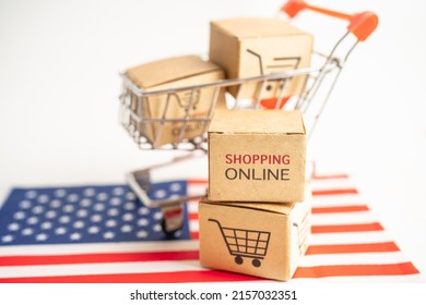 Box with shopping online cart logo and USA America flag, Import Export Shopping online or commerce finance delivery service store product shipping, trade, supplier concept. - Shutterstock ID 2157032351