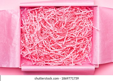 Box With Shredded Pink Paper Packing Material