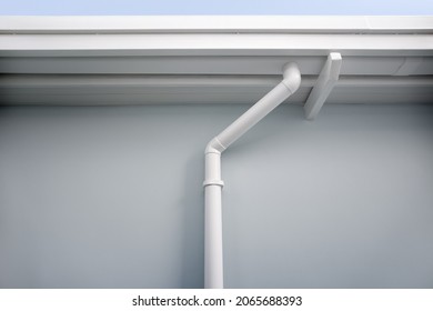 Box Or Square Style Gutter At Roof Of House. May Call Rain Gutter, Eavestrough. Look New Clean Condition. To Connection With Pvc Downpipe, Downspout Or Spout, Pipe And Pipeline For Drainage System.