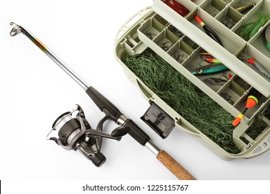 Box With Tackle And Fishing Rod On White Background