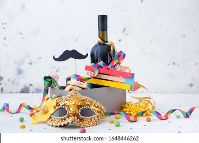 Box With Tasty Hamantaschen And Party Decor For Purim Holiday On White Background