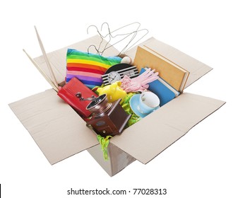 Box Of Used Items Ready For A Garage Sale, Auction, Or Donation To A Charitable Organization.  Shot On White Background.