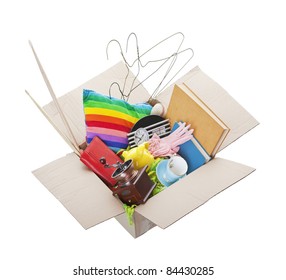 Box Of Used Items Ready For A Garage Sale, Auction, Or Donation To A Charitable Organization.  One Man's Junk Is Another Man's Treasure!  Shot On White Background.