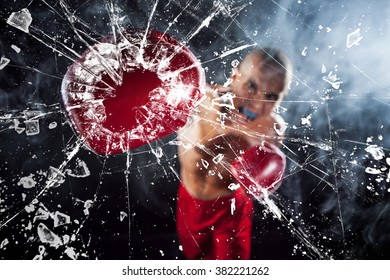 The boxer crushing a glass