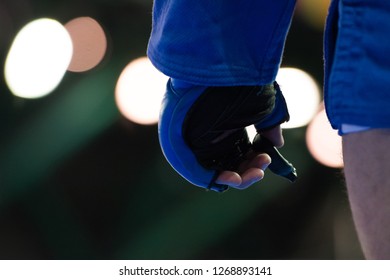 Boxer Holds In Arm Mouthguard