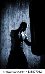 Boxer Man During Boxing Hiting Heavy Bag At Training Fitness Gym