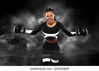 The boxer. Mixed martial arts fighter celebrating victory on black background with neon lights. Sports website header template. Copy space for boxing design. Download photo for sports betting design.