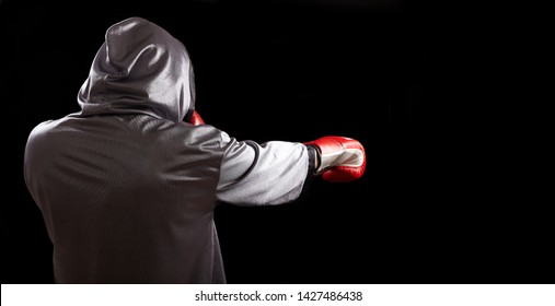 Boxer with red boxing glove doing shadow boxing.  - Powered by Shutterstock