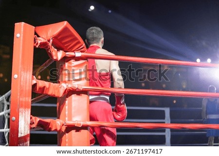 Boxer in the red corner of the ring before sparring