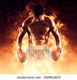 Boxer in red gloves on fire background. Toned image