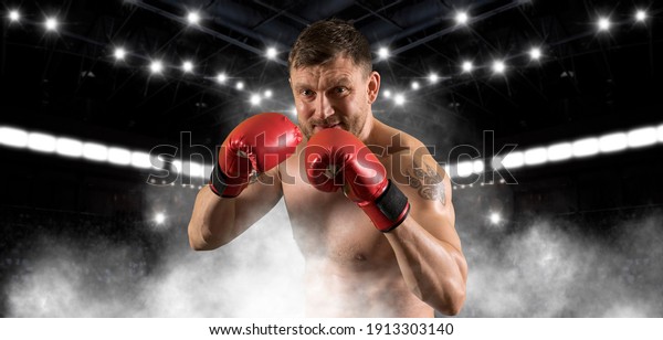 Boxer in red gloves. Sports banner. Horizontal\
copy space background