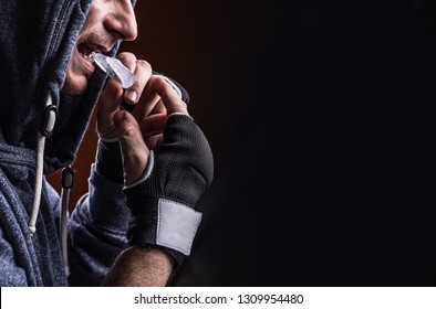 boxer teeth protection. mouthguard - Shutterstock ID 1309954480