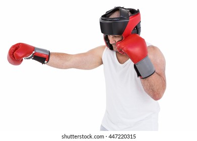 Boxer wearing head protector and gloves isolated on white background - Powered by Shutterstock