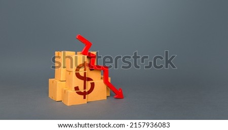 Boxes with dollar symbol and down arrow. Decrease in stocks of products. The fall in the production of goods. Worsening trade. Embargo, sanctions. Low consumption. Economic slowdown. Price reduction