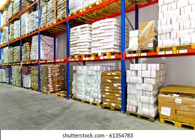 Boxes With Frozen Food At Shelf In Warehouse