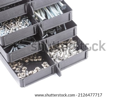 Boxes full with nuts and bolts. Workshop concept with tool box