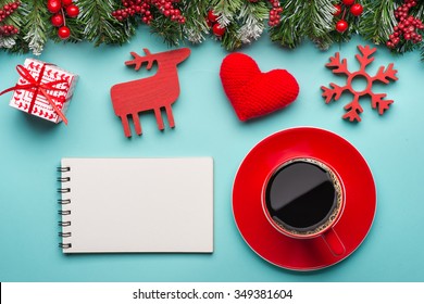 Boxes with gifts on a blue cyan background. White notepad. Happy new year. Space for text. Colorful Concept. New Year background. Christmas. Xmas. Noel. - Powered by Shutterstock