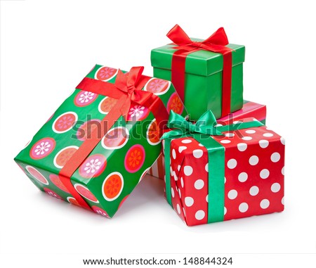 Boxes with gifts tied with red ribbon and bows isolated on white background