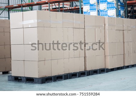 Boxes keep of warehouse. Rows of shelves with boxes