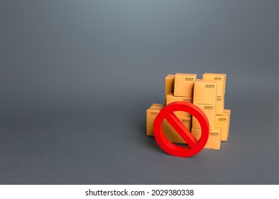 Boxes and prohibition symbol NO. Trade wars. A ban on the import of goods. Impossibility of transportation, oversupply. Shortage of goods. Sanctions and embargoes. Confiscation of contraband. - Shutterstock ID 2029380338