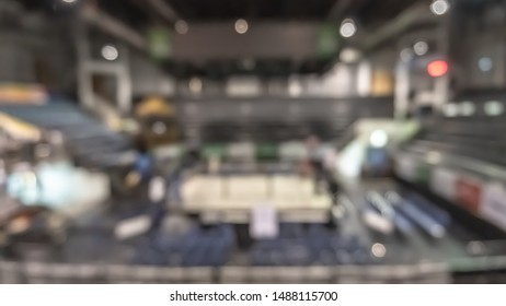 Boxing Arena With Box Ring Blur Background For Muay Thai Combat Sport Fight Match Battle With Blurry Stage And Empty Stadium Hall For Audience From Top View