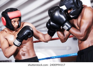 Boxing, black man and sparring partner in ring together with headgear, gloves and fitness, power training, challenge. Strong body, fighting and boxer in helmet, fearless and confident in competition.