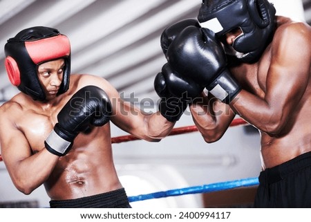 Boxing, black man and sparring partner in ring together with headgear, gloves and fitness, power training, challenge. Strong body, fighting and boxer in helmet, fearless and confident in competition.