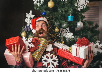 Happy Boxing Day Messages, Wishes, Quotes, And Images 45 boxing day and cyber Monday, New year. Santa claus man with present box at christmas tree. Christmas man with beard on happy face hold gift. shopping and party celebration. Winter holiday and xmas.