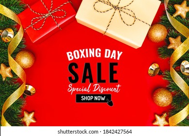 Boxing Day Sale With Christmas Present And Xmas Decoration On Red Background