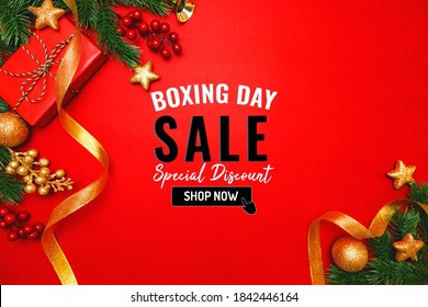 Boxing Day Sale With Christmas Present And Xmas Decoration On Red Background