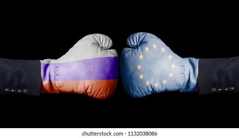 Boxing Gloves With European Union And Russian Flag. European Union Versus Russia Concept On Black