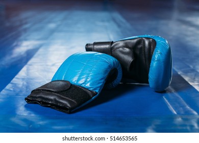 Boxing Gloves On The Floor Of The Ring.