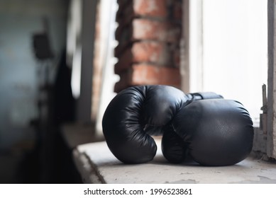 Boxing Gloves On The Window Sill Close Up Background.