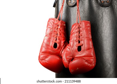 Boxing gloves and punching bag isolated - Powered by Shutterstock