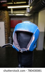 Boxing Head Guard Stored On Top Of A Boxing Ring Post