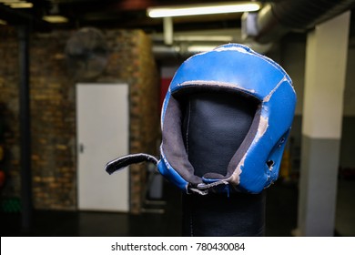 Boxing Head Guard Stored On Top Of A Boxing Ring Post