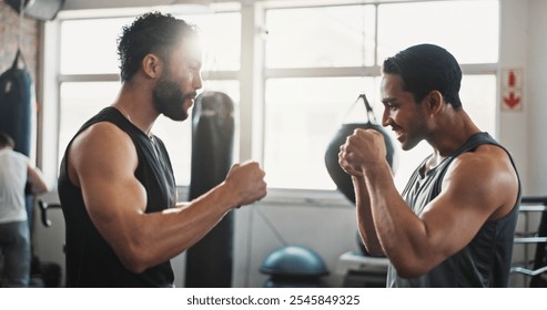 Boxing, man and personal trainer in gym with fist bump, motivation and training for sport and strength in wellness club. Coach, smile and sweating athlete and boxer with exercise for fight and match - Powered by Shutterstock