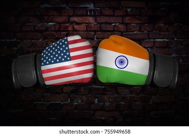 A Boxing Match. Confrontation Between The India And USA. Indian And American National Flags On Boxing Gloves. Sports Competition Between The Two Countries. Concept Of The Foreign Policy Conflict