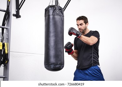 Boxing Punch Bag Guy In Gym