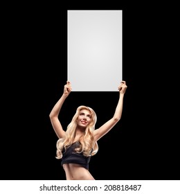 Boxing Ring Girl Holding A Board With Round Number Isolated On Black Background. High Resolution 