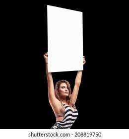 Boxing Ring Girl Holding A Board With Round Number Isolated On Black Background. High Resolution 