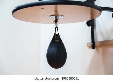 Boxing Speed Bag With A Fist On White Background
