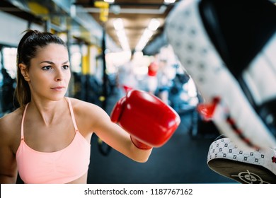 Boxing workout woman in fitness class ring - Powered by Shutterstock